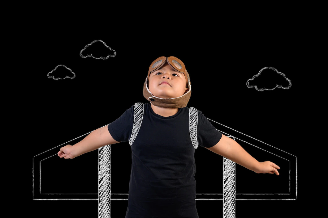 boy-pretends-be-superhero-is-playing-as-astronaut-draw-concept_1150-19573 (1).webp