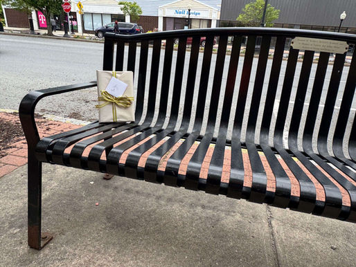 Wrapped book on a public bench