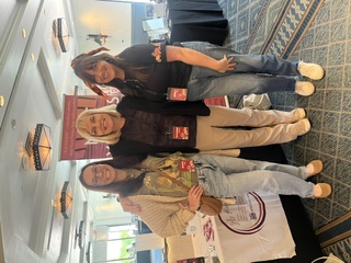 Jennifer Sadera with readers at Author Expo Creepy Retreat