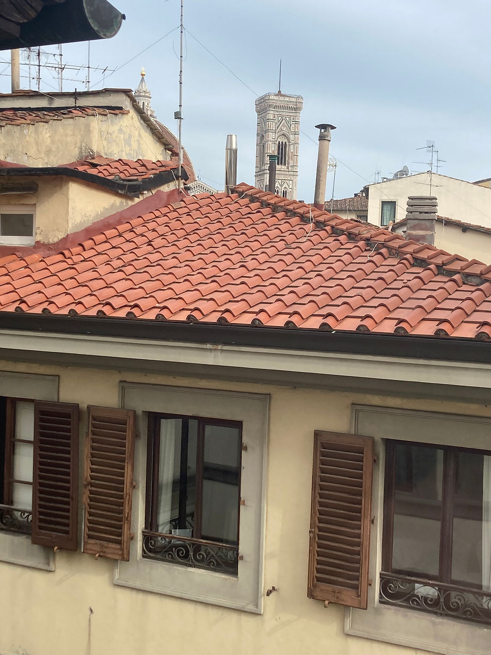 Couldn't get enough of the view from our hotel window of the red tile roofs with the campanile in the distance