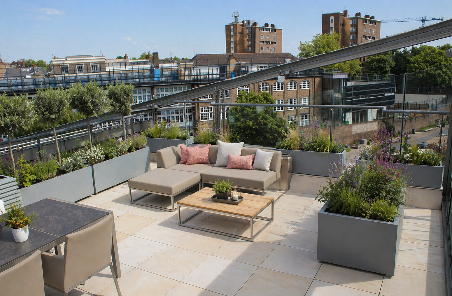 Learn about roof terrace planters, including weight, drainage, access and practical considerations before installing planters on a roof terrace.