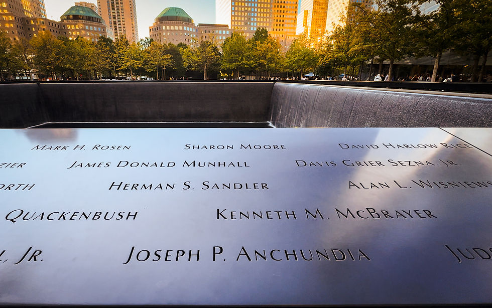 Joseph Anchundia's name, inscribed in bronze, at the reflecting pool at the 9/11 Memorial.