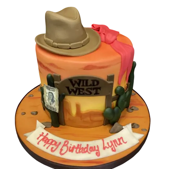 Bespoke Wild West celebration cake with cowboy hat, boots, and cacti decorations in Solihull, West Midlands.