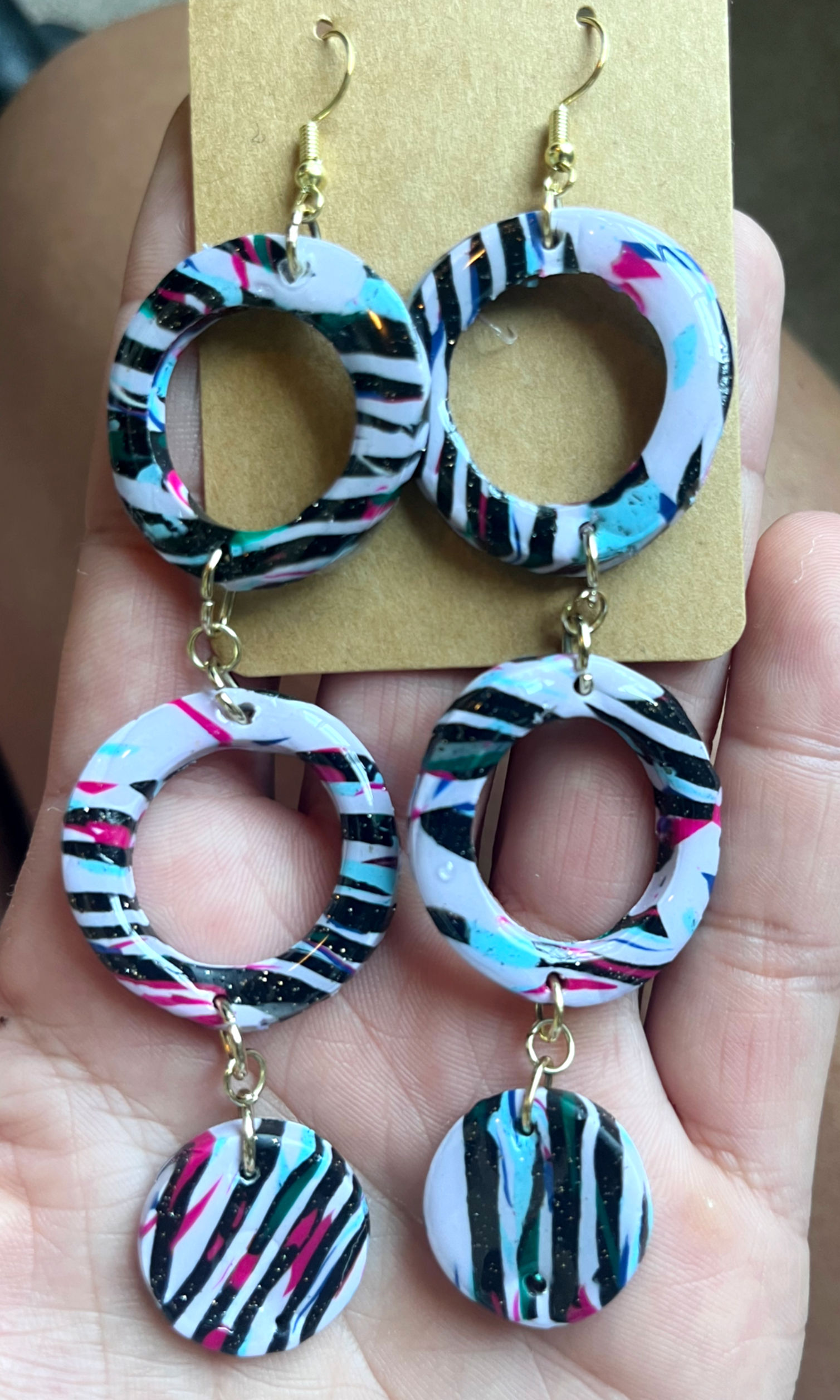 Black and purple zebra stripe dangly's