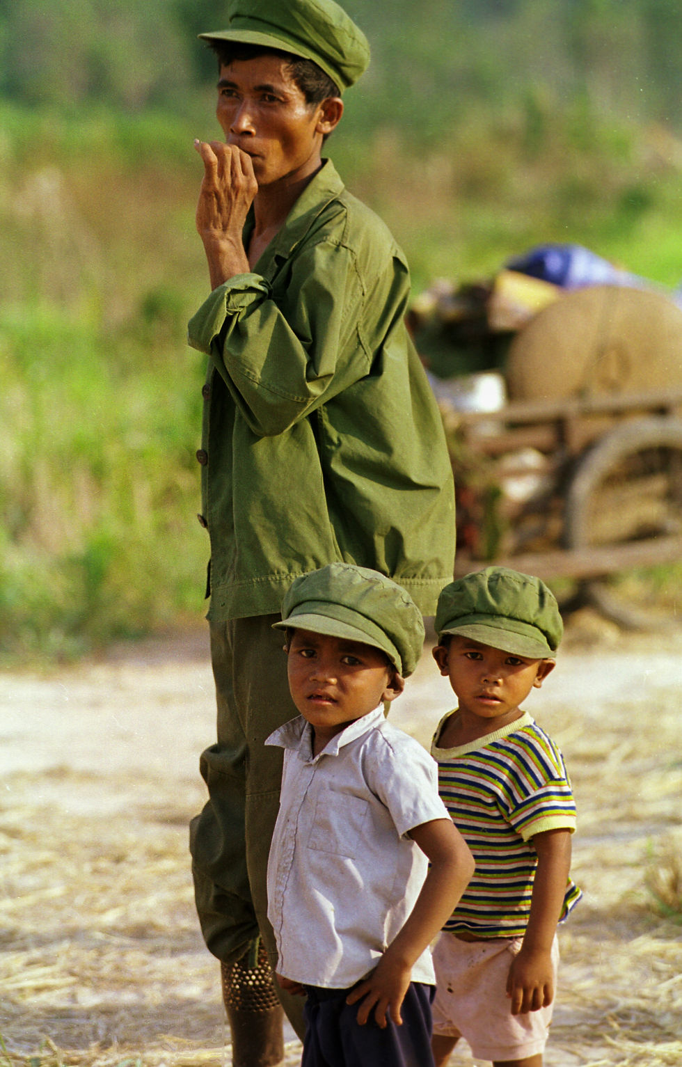 Khmer Rouge soldier with his sons