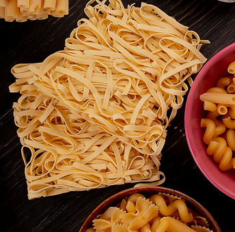 top-view-macaronis-as-tagliatelle-bucatini-fusilli-others-wood.jpg