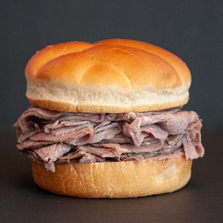 Roney’s classic fresh roast beef sandwich served hot and piled high