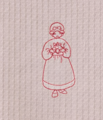 Miniature : Détail de la broderie personnage rétro sur torchon en coton nid d'abeille