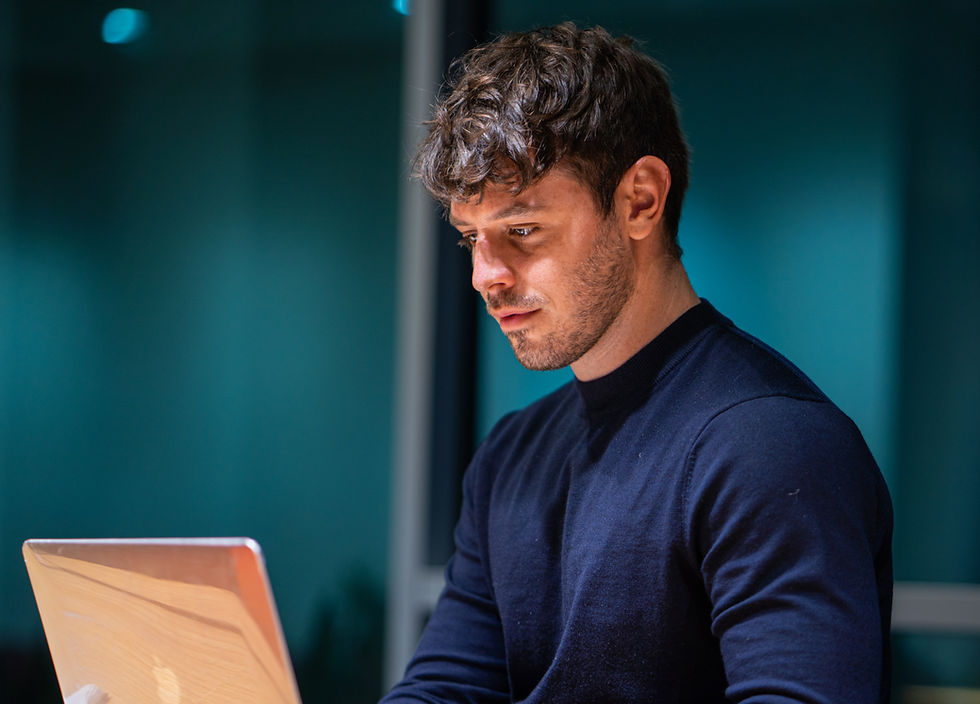 man in black long sleeve shirt using macbook_edited_edited_edited.jpg