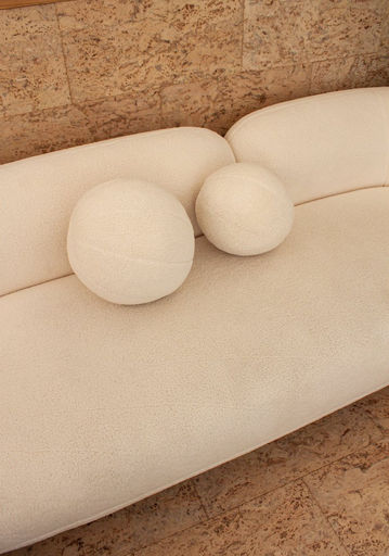 Avenue Dental, New Generation Cork, Calais Cream, Harvest Collection, Sienna, Marble Cork, white lounge with pillows against cork wall and on cork flooring, cork tiles Canberra