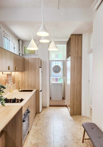 Compact Home, New Generation Cork, Calais Cream cork, kitchen with bench top, stove and light with cork flooring