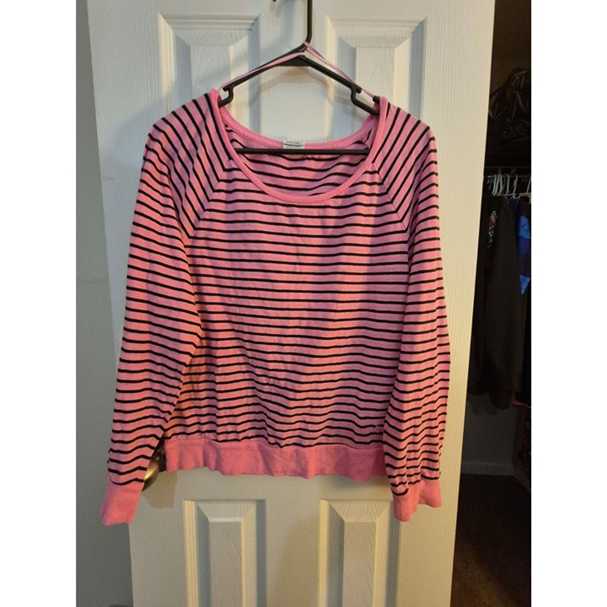 Pink and black striped long-sleeved sweatshirt