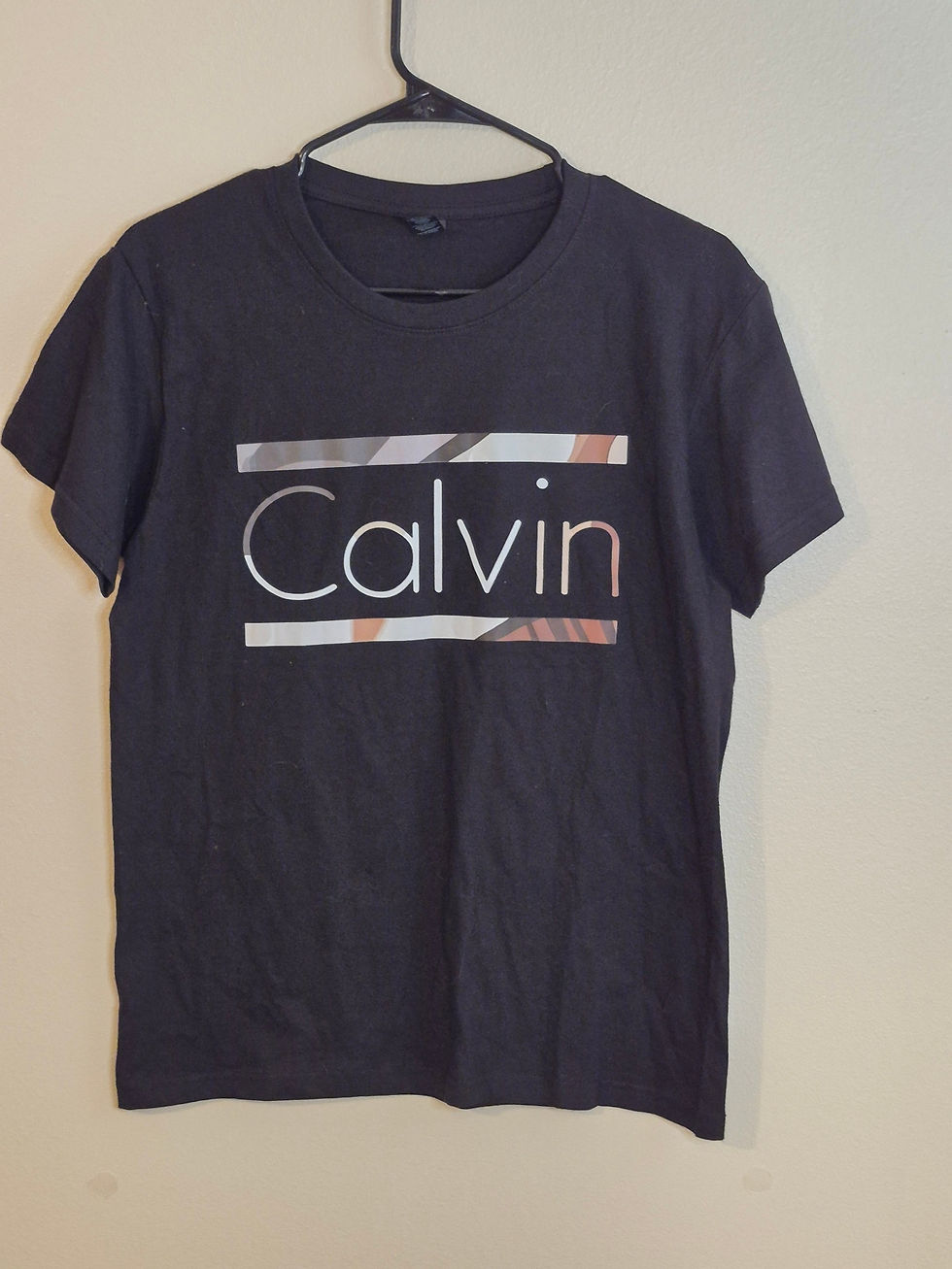 Black t-shirt with silver Calvin logo