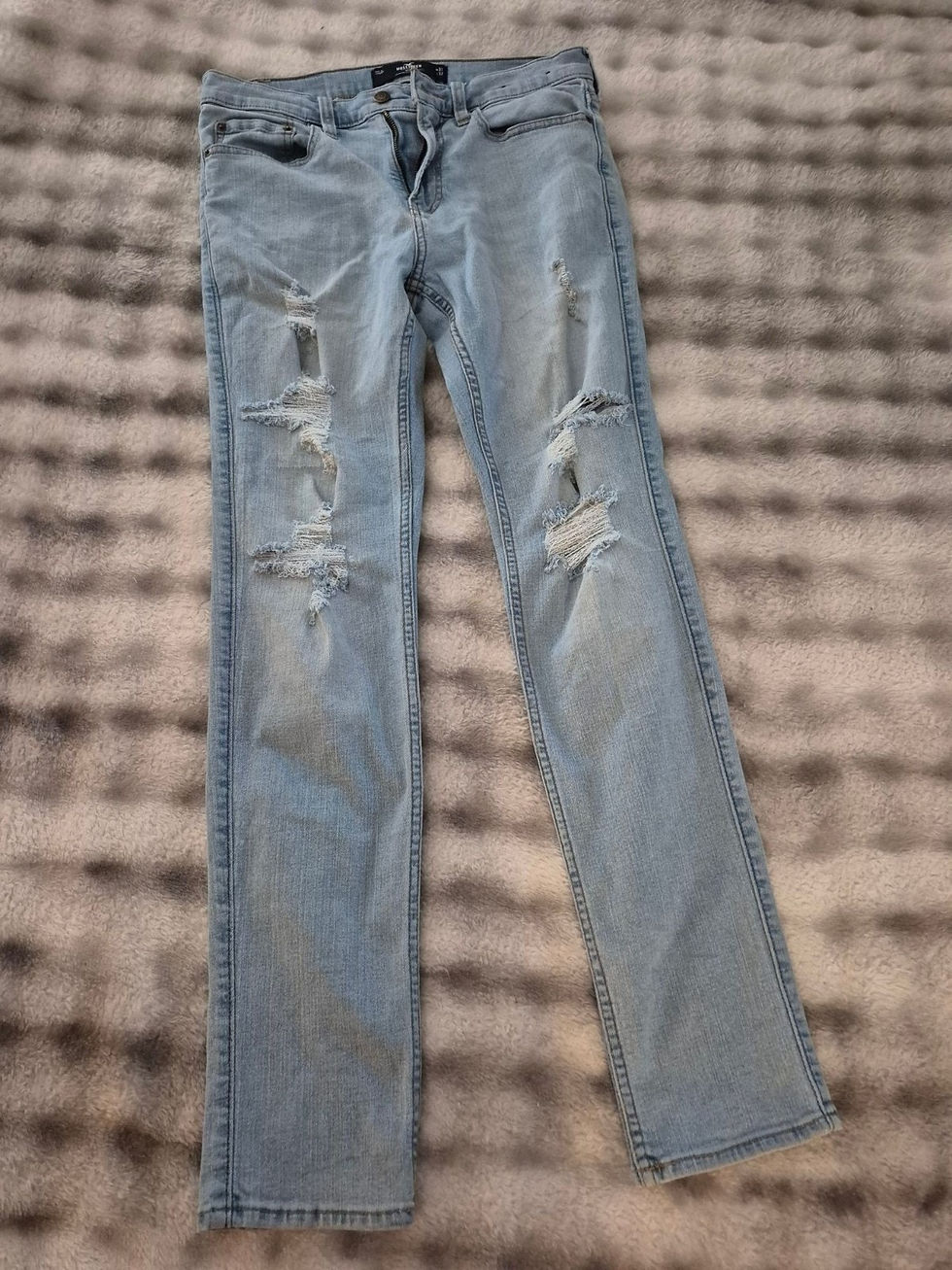 Light blue distressed jeans