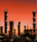 orange sky over petrochemical refinery