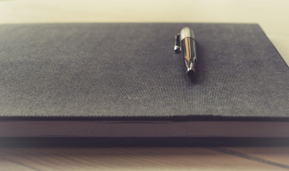 Pen On Notebook
