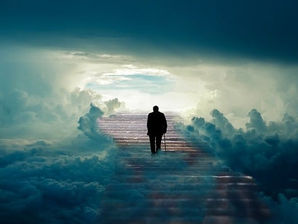 Man walking up the stairs with blue fogs and clear sky