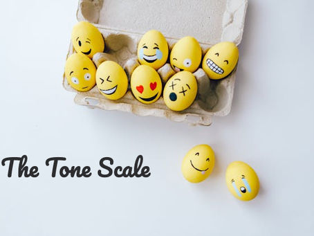 Yellow eggs box with various smileys