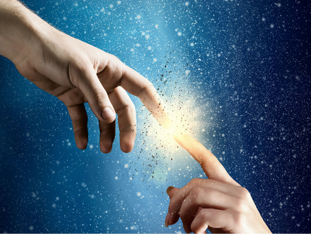 2 fingers connecting with a sparkle between