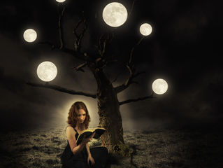 Create a Surreal Artwork of a Tree with Moons in Photoshop woman reading