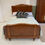 Thumbnail: Kingsize walnut wooden bedstead with beautiful ivy leaf filigree