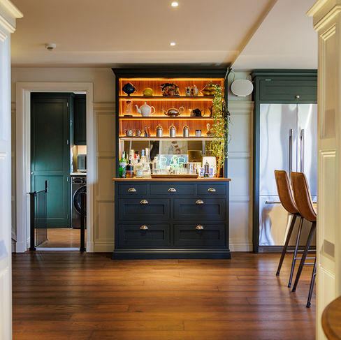 A bespoke cottage kitchen in Guildford painted in Obsidian Green by Little Greene