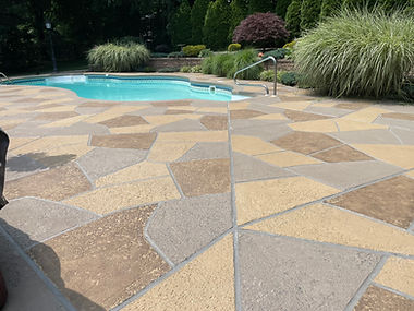 Pool deck resurfaced in Hurricane Slate finish with refined surface texture