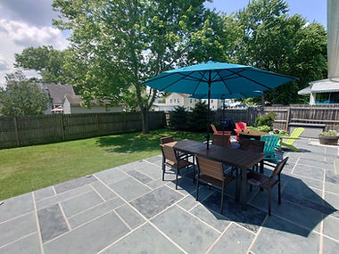 Residential pool deck in Granite Slate color theme after concrete resurfacing.