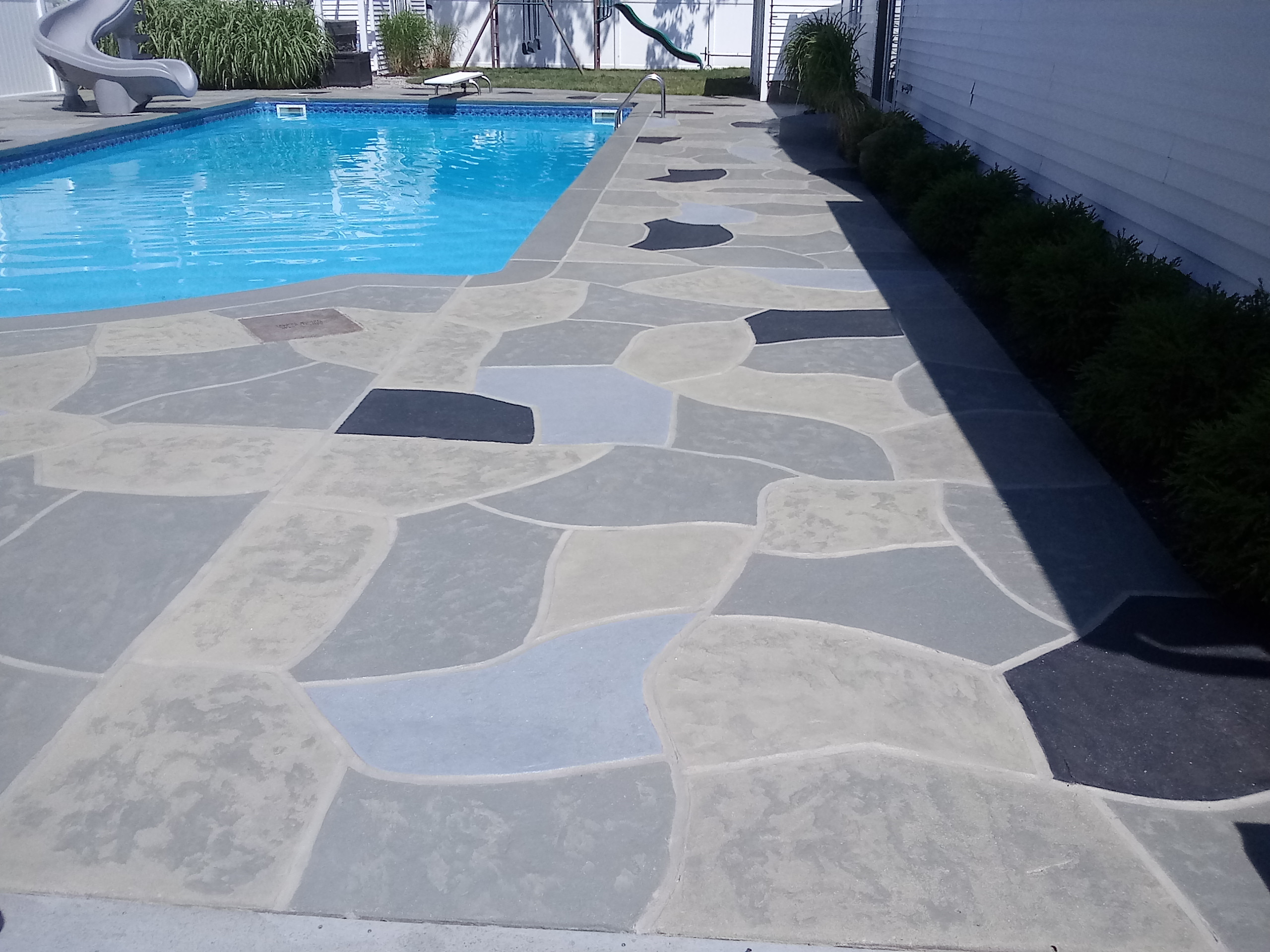 Granite Slate Pool Deck Renovation: Modern Gray Stone Look | RenuKrete