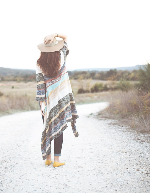 Women walking on a path, feeling lost and searching for her purpose.