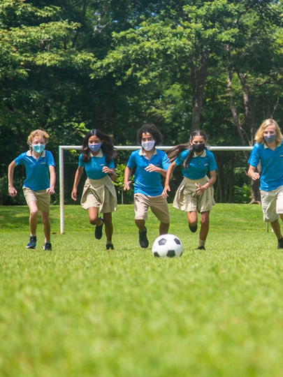 KidsPlayingFootball3.jpeg