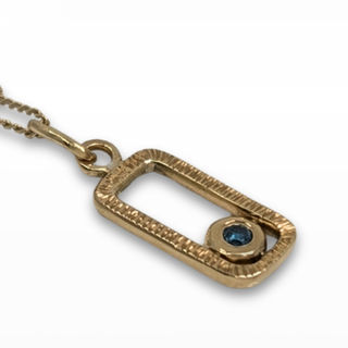 Blue Sapphire set in 9ct yellow gold.