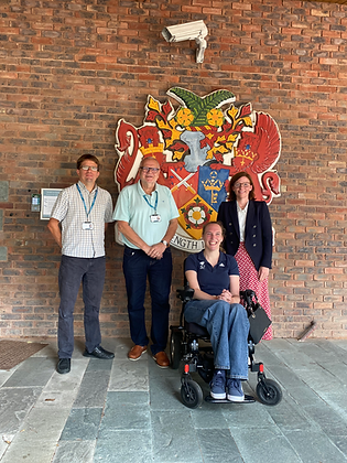Sophie at Rushmoor Borough Council Offices with (from left to right) Councillor Thomas Day, Councillor Keith Dibble, Sophie and MP Alex Baker.