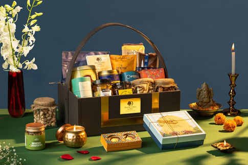 Luxury festive gift hamper with gourmet snacks, dry fruits, chocolates and premium packaging, Diwali corporate gifting.