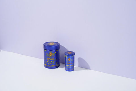 Premium pan masala tin packaging photographed in a clean studio setup with minimal shadows.