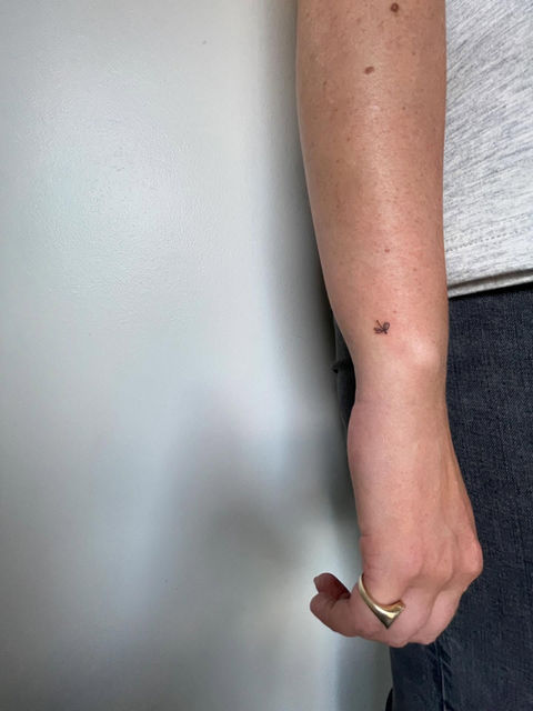wrist freckle tattoo