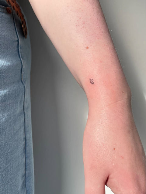 Person's forearm with a tattoo