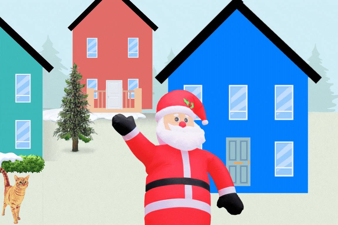 An inflatable Santa and a house blowing away