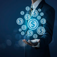 Growing money concept for business investment and finance. Businessman holding money coin