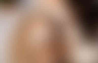 A boy looks up during a child photo session with photographer Ashley Stack Photography