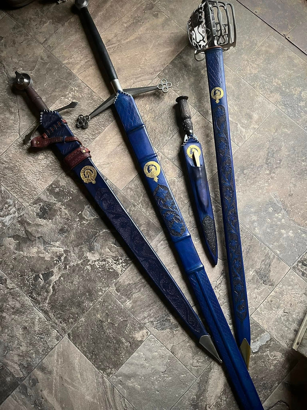 Group of matching scabbards for a family of Scottish swords