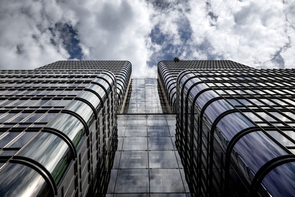 The facade of a beautifully engineered residential building that highlights buildings architecture.