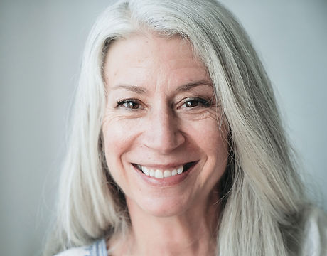 Smiling Mature Woman with Gray Hair