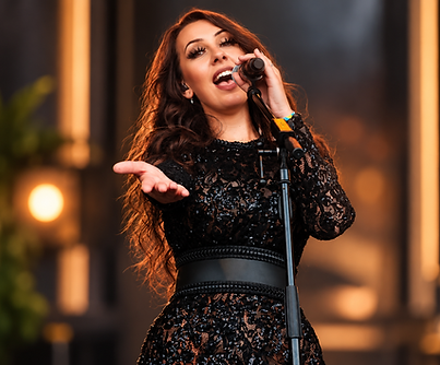 Glamorous Singer Under Warm Stage Lights.png