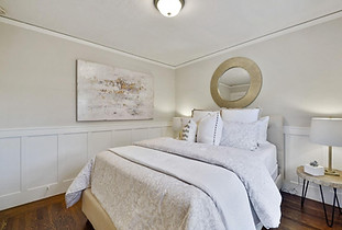 Elegant bedroom design with neutral tones and gold accents