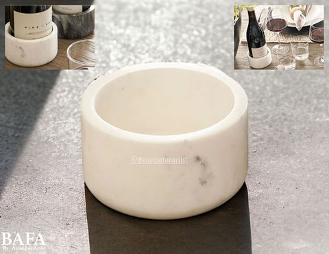 Elevate your table setting with BAFA's cylindrical wine bottle holder, crafted from luxurious marble. Perfect for both room decor and serving, it's a stylish gift for any occasion