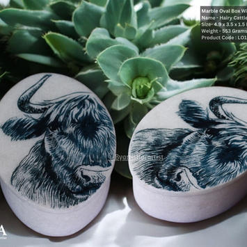 Elegant marble oval box featuring a hand-painted yak design, perfect for gifting in hotels. This luxurious box combines the timeless beauty of marble with detailed, hand-painted artwork of a yak, adding a touch of cultural charm and sophistication. Ideal for hotel gifting programs or upscale welcome packages, it provides a unique and distinguished keepsake. The marble oval box merges practical utility with artistic elegance, making it a sustainable and thoughtful gift option that enhances the guest experience with its blend of refined design and cultural artistry