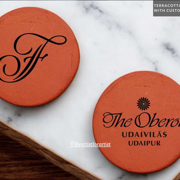 Custom Terracotta Coasters with Hotel Logo – Enhance your guest experience with personalized terracotta coasters featuring your hotel’s logo. Crafted from durable, eco-friendly materials, these coasters add a rustic charm while protecting your surfaces. Perfect for hotels, resorts, or restaurants, they can be customized with your logo, creating a lasting impression for your brand. Ideal for use in guest rooms, lounges, or dining areas, these unique coasters combine practicality with style. Order custom terracotta coasters today and give your hotel a memorable, eco-conscious touch