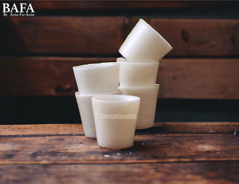 Elevate your tableware collection with BAFA's marble shot glass. Its exquisite design adds a touch of luxury to any setting, making it a perfect gift for any occasion. Whether for serving drinks or as a decorative accent, this shot glass exudes elegance