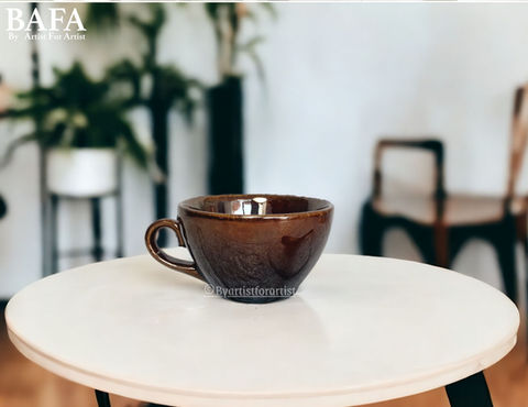 Explore BAFA's Classic Brown Wide Cup, an ideal choice for hotel restaurants and cafes for serving coffee. This ceramic stoneware cup boasts a timeless brown finish, offering a touch of elegance to your beverage service. With dishwasher and microwave-safe properties, they ensure convenience in busy settings. Lead-free and double-durable, they prioritize safety and longevity. Customize them to any finish to match your establishment's aesthetic. Elevate your coffee presentation with these reliable and stylish brown wide cups from BAFA